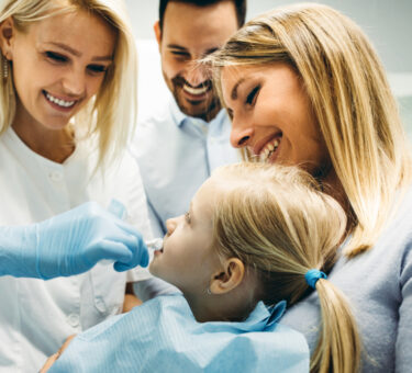 Family receiving care at a family dental clinic with a children's dentist in Darwin specialising in family dentistry.