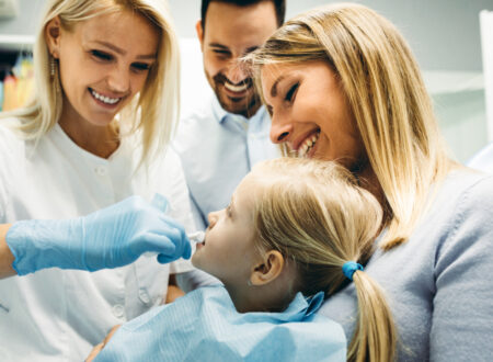 Family receiving care at a family dental clinic with a children's dentist in Darwin specialising in family dentistry.