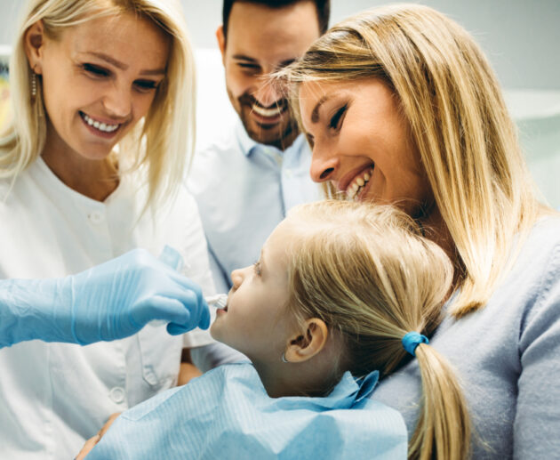 Family receiving care at a family dental clinic with a children's dentist in Darwin specialising in family dentistry.