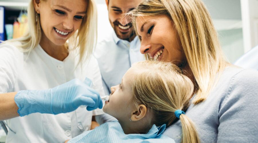 Family receiving care at a family dental clinic with a children's dentist in Darwin specialising in family dentistry.