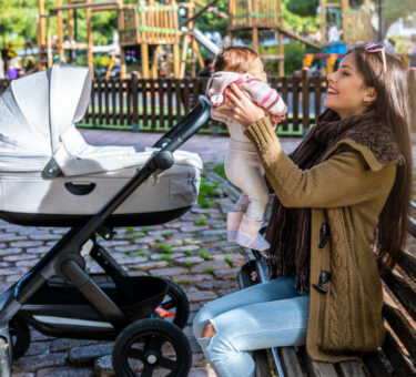 Family-friendly playground featuring thoughtful urban designs, comfortable public seats and practical park furniture for parents and children.